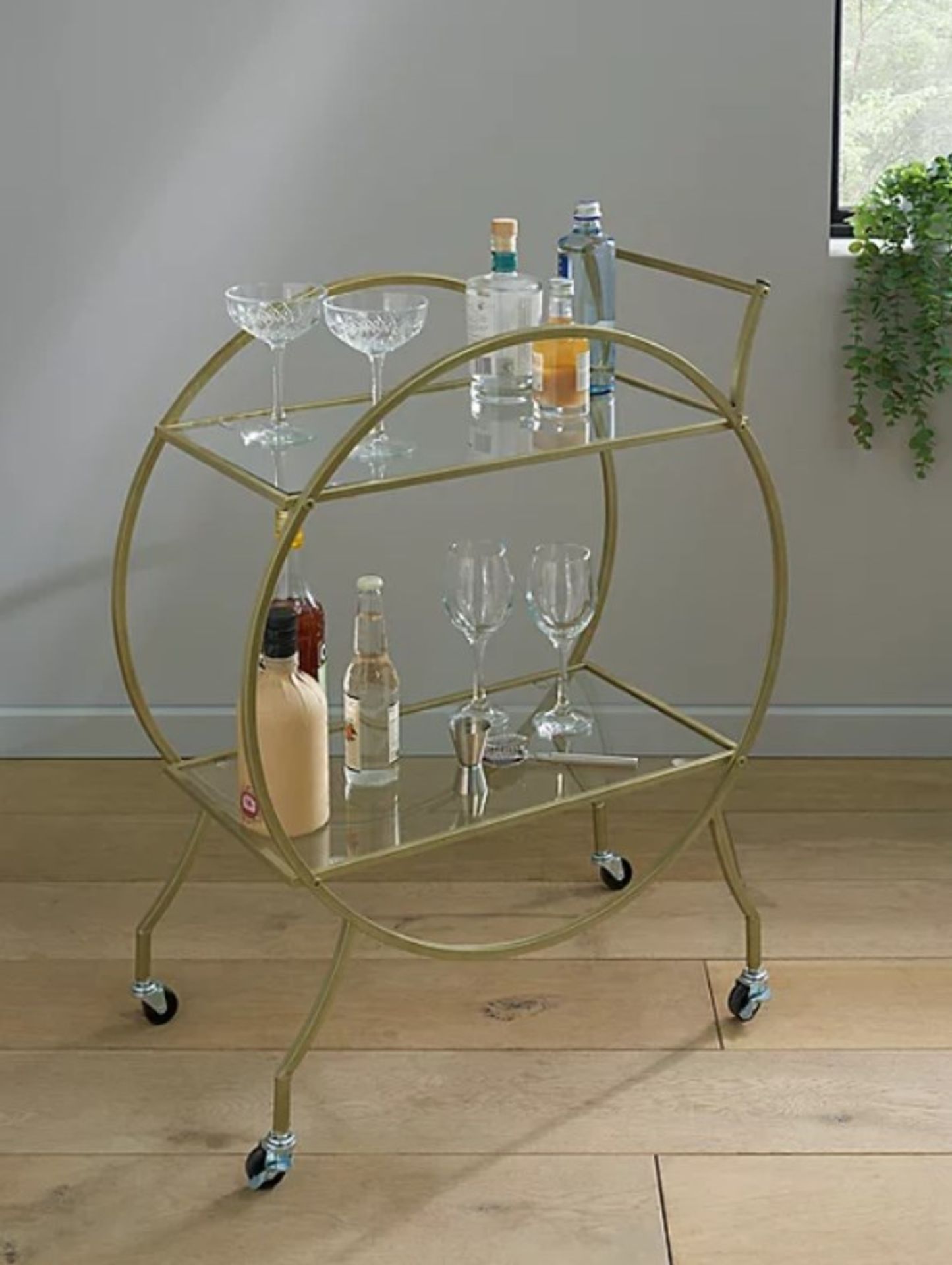 (32/1D) Lot RRP £85. 3x Items. 2x Gold Metal Trim Drinks Trolley RRP £30 Each. 1x Gold Tone Half...