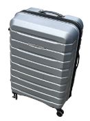 Grey Suitcase, Unclaimed Luggage from our Private Jet Charter
