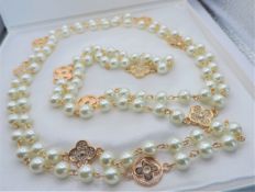 60 Inch Opera Length Pearl and Crystal Charm Necklace