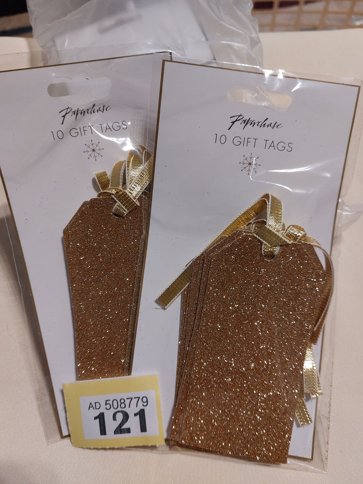 Gold Glitter Tags. Box of 120 Packs of 10. RRP £180