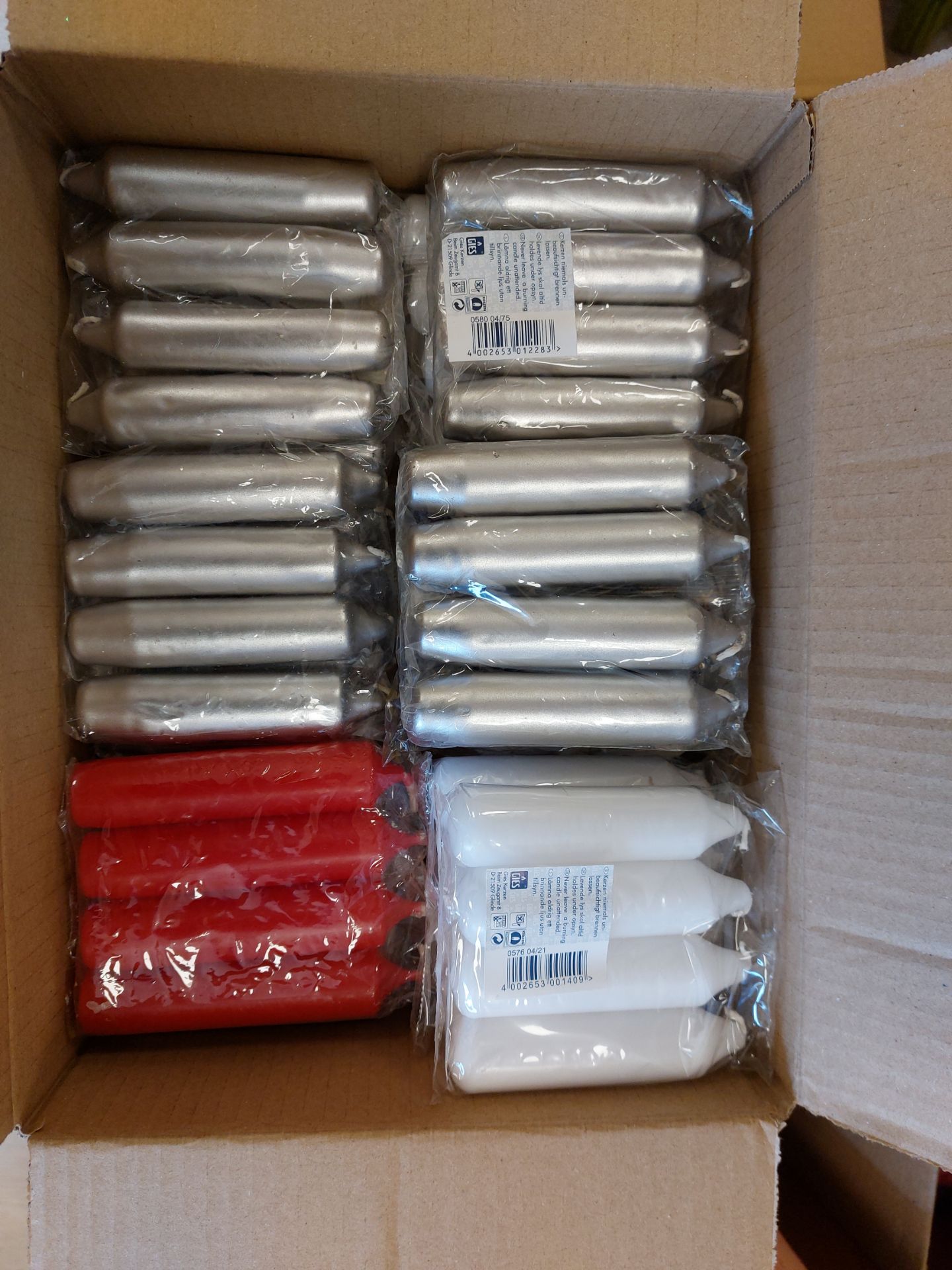 Box of Red, White and Silver Candles. 10 Packs