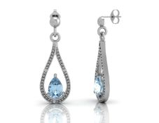 9ct White Gold Diamond And Blue Topaz Earring 0.02