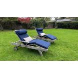 A PAIR OF INDIAN OCEAN SUN LOUNGERS, with Indian Ocean blue upholstered cushions. All labelled.