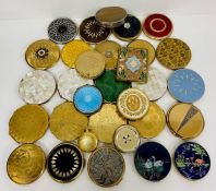 A large selection of collectable compacts, various makers and designs.