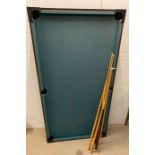 A snooker/pool table with folding legs (W167cm D95cm)