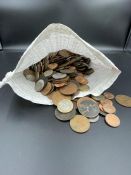 A Bag of assorted coins, range of countries, denominations and conditions.