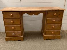 A pine dressing table or desk with stool (H77cm W137cm D43cm)