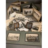 A selection of historical photographs including Graf Zeppelin, Belgium solider graves and touring