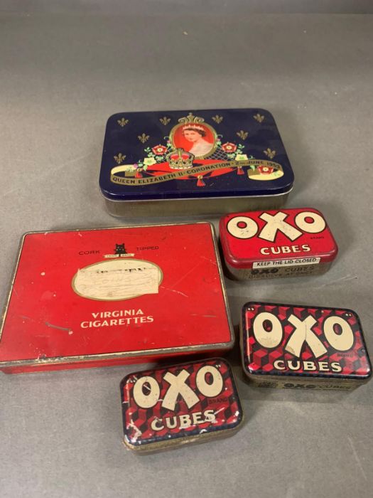 Five vintage adverting tins