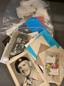 A selection of vintage postcards, photographs etc
