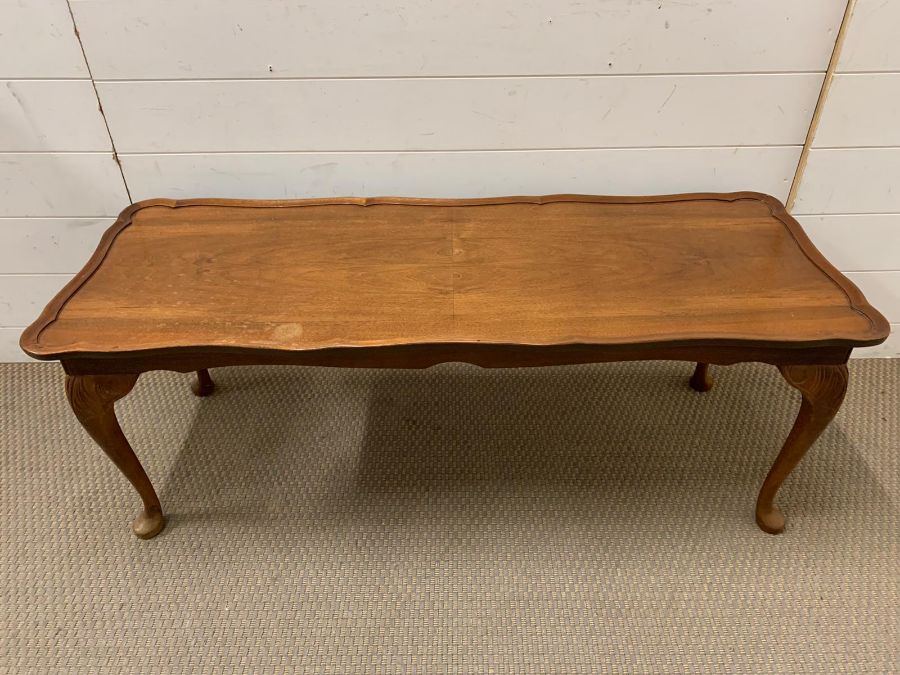 A long coffee table with scrolled/waved rim on cabriole legs (H43cm W113cm D42cm) - Image 2 of 3