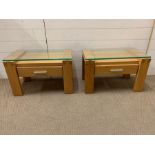 Two glass top oak bedsides (H41cm W62cm D35cm)