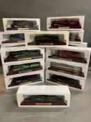 A selection of scale models of locomotives on stands