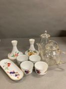 A selection of Evesham Royal Worcester china and two clear teapots