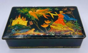 A Large Russian lacquered box, dated 1972 and signed to base of picture.(17cm x 10 cm x 4cm)