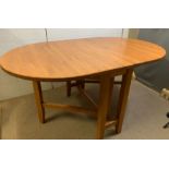 An oval kitchen/dining table (146cm x 92cm Open 38cm Folded)