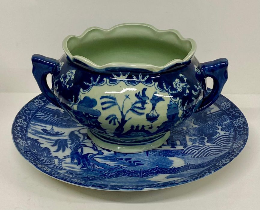 A blue and white platter with floral boarder(Dia 31cm) along with a two handle pot various ages (