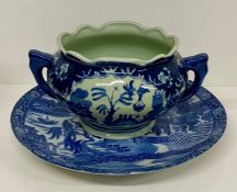 A blue and white platter with floral boarder(Dia 31cm) along with a two handle pot various ages (