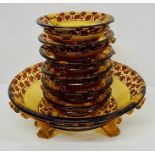 Amber and brown large glass serving bowl and six small dishes
