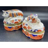 Two Imari style Japanese made pill boxes, a frog and a pig.