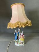A china lamp base with courting couple.