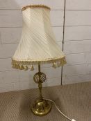 A brass table lamp