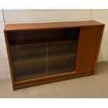A Mid Century Bookcase with glazed front (H85cm W122cm D25cm)