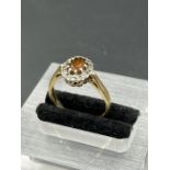 A 9ct gold ring with garnet setting (Total Weight 2.6g Size M