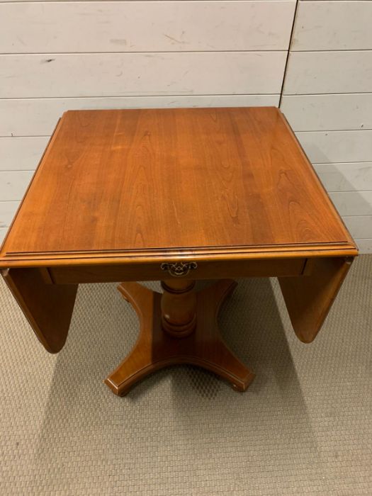 A drop sided side table with drawer to centre (Open W131cm H65cm) - Image 2 of 5