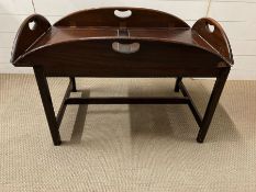 A mahogany butler tray