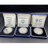 Three commemorative silver proof two pound coins 1989 and 1988 Guernsey, along with States of Jersey