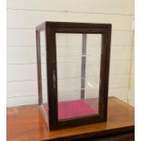 An oak display cabinet