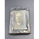 A miniature silver picture frame (6.5cm x 4.5cm)
