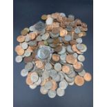 A selection of UK coins, different denominations, years and conditions.