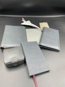 Concorde memorabilia: to include wallet, notebook, pen, address book, mirror, cuff link holder and a