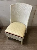 A painted Lloyd Loom style chair