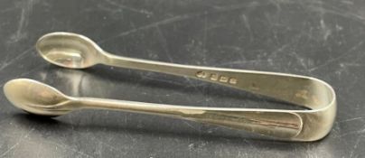 A pair of 1922 silver sugar nips by Elkington & Co