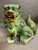 A green porcelain china foo dog (H23cm)