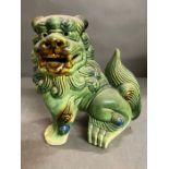 A green porcelain china foo dog (H23cm)