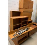 A teak wall system/modular Tapley 33, consisting of cupboard base, wall hanging cupboards and open