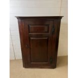 A mahogany wall hanging corner unit