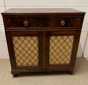 A mahogany chiffonier, two drawers and a pair of pleated lined brass trellis door on turned feet