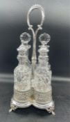 A Vintage Topazio silver cruet set with crystal cruets with silver mounts.