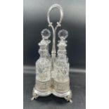 A Vintage Topazio silver cruet set with crystal cruets with silver mounts.