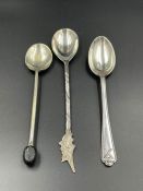 Three various silver teaspoons.