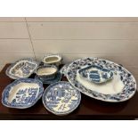 A selection of blue and white china platters and serving dishes