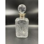 A cut glass decanter with hallmarked silver collar, Sheffield 1994 by Camelot Silverware Ltd.