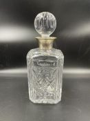 A cut glass decanter with hallmarked silver collar, Sheffield 1994 by Camelot Silverware Ltd.