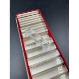 A boxed set of twelve knife rests some by Baccarat