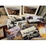Three storyboards of movie memorabilia photographs and Indiana Jones book along with be hide the